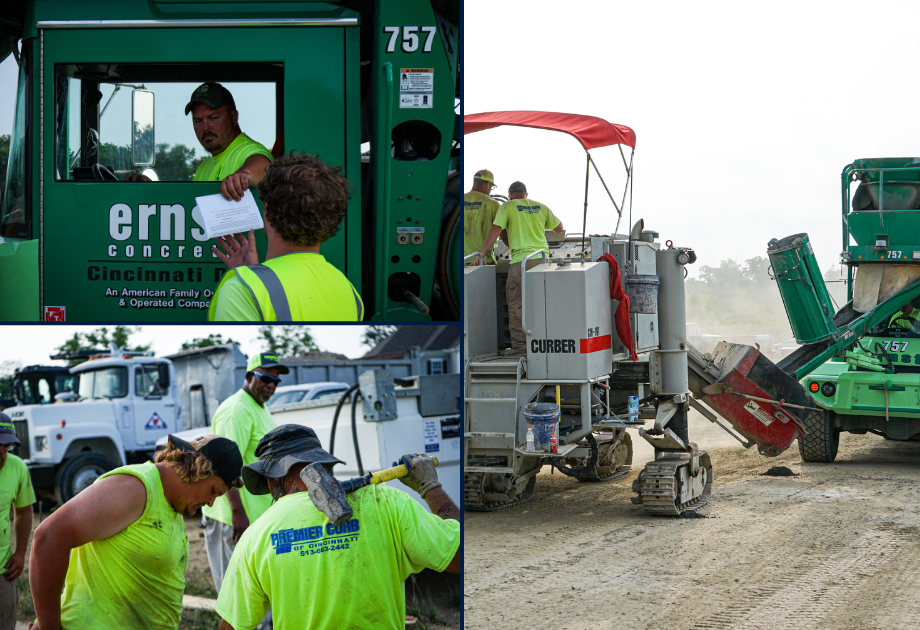 Construction workers operating equipment at a job site with a concrete paving machine.